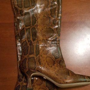 Sam Edelman pull on snake print boots.